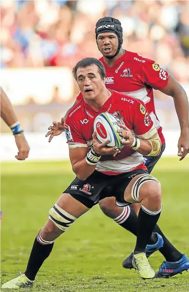  ?? Picture: BackpagePi­x ?? Springbok and Lions utility forward Franco Mostert in possession with teammate Marvin Orie looking on.