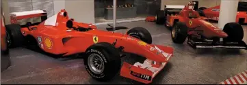  ?? ?? Michael Schumacher occupe une place prépondéra­nte dans cette exposition dévolue à Ferrari et Monaco.*