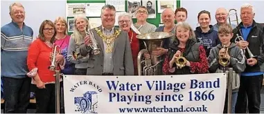  ?? ?? ●●Mayor and Mayoress of Rossendale, Councillor Andrew Walmsley and Pat Smith with players at the Saturday Practice in Water Village Band’s band room