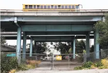  ?? Santiago Mejia / The Chronicle ?? Land under Highway 101 between 16th and 17th streets is one of the plots that could become a park or green space.