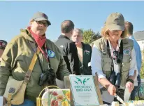  ?? JEANNE STACEY ?? Marnie Baker, left, and Pat Hayes take part in an Important Bird Area designatio­n celebratio­n on Sept. 9, 2017.