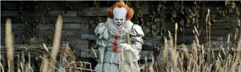  ?? Warner Bros Pictures via AP ?? Bill Skarsgard as Pennywise, the film’s terrifying killer clown