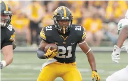  ?? AP ?? Iowa’s Ivory Kelly-Martin averaged 9.2 yards on 20 carries as a freshman.