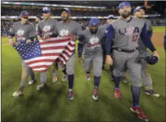  ?? THE ASSOCIATED PRESS ?? The U.S team celebrates an 8-0win over Puerto Rico in the final of the World Baseball Classic in Los Angeles on Wednesday night.