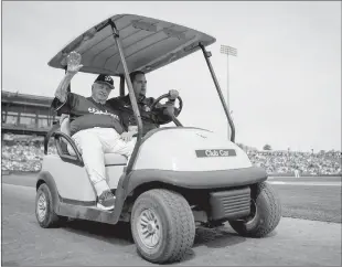  ?? Jennifer Stewart / Getty Images /TNS ?? In this file photo, former Los Angeles Dodgers player and managertom­my Lasorda waves to fans during the spring training game between the Seattle Mariners and Los Angeles Dodgers at Camelback Ranch on March 9, 2019 in Glendale, Arizona.