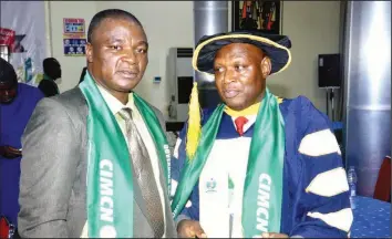  ?? PHOTO… PHILIP OJISUA ?? Director- General, Chartered Institute of Mentoring and Coaching, Nigeria ( NIMCN), Dr. Rotimi Matthew, presenting Doctorate Certificat­e to Dr. Joseph Omokhagbo after being decorated with Honorary Doctorate Degree from Prowest University USA, during the National conference of NIMCN in Abuja