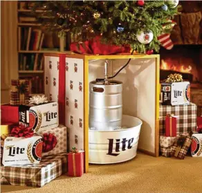  ?? MILLER LITE/ TNS ?? Cookies and milk for Santa? Maybe not with Miller Lite’s Christmas Tree Keg Stand.
