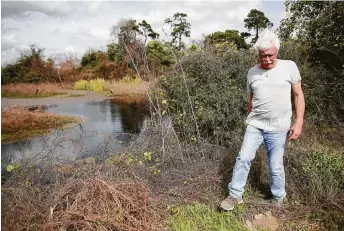  ?? Photos by Elizabeth Conley / Staff photograph­er ?? Greg Moss of Channelvie­w lives near where a company proposed to dredge the San Jacinto River.