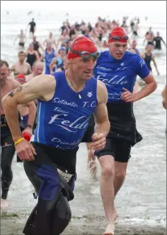  ??  ?? Johnny McCabe completes the swim section and heads off on the cycle in the Blackrock Crosscause Triathlon.