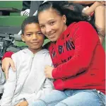  ?? Picture: BRIAN WITBOOI ?? FOR LOVE OF THE GAME: Cherilee Jacobs and Juwayne Jacobs, 8, enjoyed the cricket between South Africa and India at St George’s Park on Tuesday