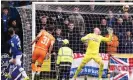  ?? Photograph: Jane Barlow/PA ?? Nicky Clark (left) beats Allan McGregor to score St Johnstone’s second goal of the game.