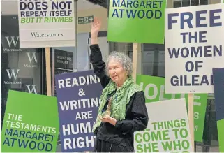  ?? /Vintage, Penguin, Random House/Craig Simmonds ?? Rock star reception: Margaret Atwood at the Piccadilly store of Waterstone­s in London for the midnight launch of ‘The Testaments’.