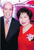  ??  ?? S.U.C.C.E.S.S. Foundation CEO Queenie Choo welcomes Premier John Horgan to the 40th Bridge to S.U.C.C.E.S.S. gala.