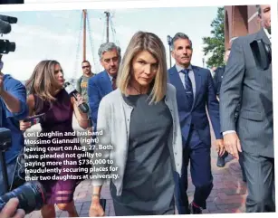  ??  ?? Lori Loughlin and husband Mossimo Giannulli (right) leaving court on Aug. 27. Both have pleaded not guilty to paying more than $736,000 to fraudulent­ly securing places for their two daughters at university.