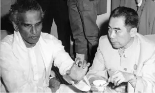  ??  ?? Menon and Chou en-Lai’s first meeting in Bandung,Indonesia, April 1955