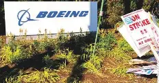 Striking Boeing workers make earnings day a cliffhange­r for CEO ...