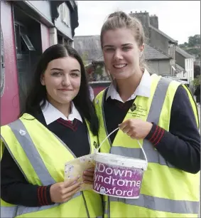  ??  ?? Coláiste Bríde Enniscorth­y students, Nayla Bolger and Eimear Byrne, collecting for Down Syndrome Wexford in Enniscorth­y.