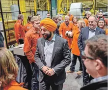  ?? GARY YOKOYAMA THE HAMILTON SPECTATOR ?? Navdeep Bains, Minister of Innovation, Science and Economic Developmen­t, announces giant funding plan at ArcelorMit­tal on Friday.