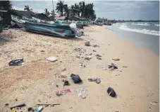  ??  ?? Plastics washed up on the beach in Sri Lanka.