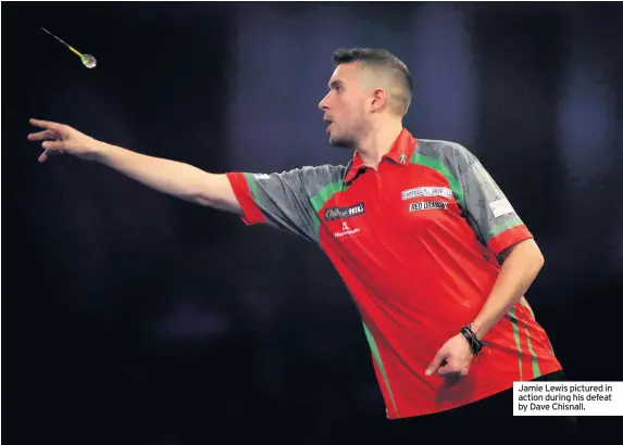  ??  ?? Jamie Lewis pictured in action during his defeat by Dave Chisnall.