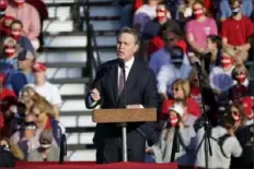  ?? John Bazemore/Associated Press ?? Sen. David Perdue, R-Ga., speaks Friday during a campaign rally for President Donald Trump at Middle Georgia Regional Airport in Macon, Ga.