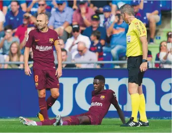  ??  ?? Injured...Ousmane Dembele is hurt against Getafe