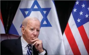  ?? MIRIAM ALSTER — POOL PHOTO VIA AP ?? President Joe Biden pauses during a meeting with Israeli Prime Minister Benjamin Netanyahu to discuss the war between Israel and Hamas, in Tel Aviv, Israel, on Oct. 18.