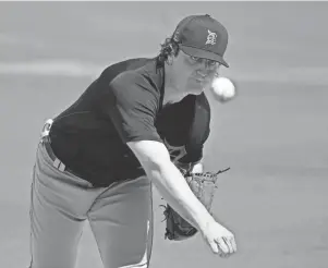  ?? GENE J. PUSKAR/AP ?? Detroit Tigers pitcher Casey Mize delivers during the first inning of a spring training game against the Pittsburgh Pirates in Bradenton, Fla., on Tuesday.