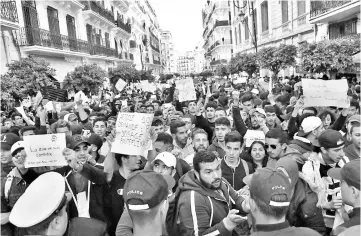  ??  ?? Algerian students demonstrat­e in the capital Algiers against ailing Bouteflika’s bid for a fifth term. — AFP photo