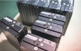 ?? James MacDonald / Bloomberg ?? Lithium-ion batteries like these at the Electrovay­a headquarte­rs have become crucial to a variety of industries, and they’re evolving quickly.