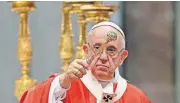  ?? [AP PHOTO] ?? Pope Francis asperges holy water as he celebrates a Pentecost mass Sunday in St. Peter’s Basilica, at the Vatican.