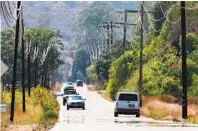  ?? U-T FILE ?? The prolonged heat wave in August was just one of the causes of rolling statewide power outages, a report says.