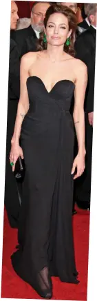  ?? ?? Matching in black: Marion Cotillard, left, and Angelina Jolie