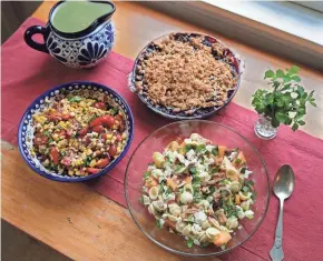  ?? RICK WOOD / MILWAUKEE JOURNAL SENTINEL ?? A Market Lunch includes (clockwise, from bottom) Pasta Salad with Melon, Pancetta and Ricotta Salata; Corn, Tomato and Basil Salad with Mustard Vinaigrett­e; and Summer Berry Crisp. More recipes on Page 5N.