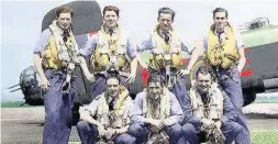  ??  ?? Halifax bomber The crew pictured in front of their aircraft with John Lauder back row second left