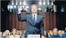  ?? ANDREW HARNIK/AP ?? President Donald Trump's Supreme Court nominee Brett Kavanaugh is sworn in before the Senate Judiciary Committee in Washington.