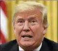  ?? SUSAN WALSH — THE ASSOCIATED PRESS ?? President Donald Trump talks about Hurricane Florence following a briefing in the Oval Office of the White House in Washington, Tuesday.