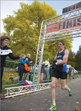  ??  ?? John McGrath, winner of the men’s 4-mile run.