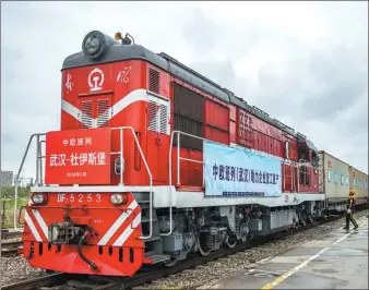  ?? KE HAO / FOR CHINA DAILY ?? A cargo train bound for Duisburg in Germany leaves Wuhan, capital of Hubei province, on March 28.
