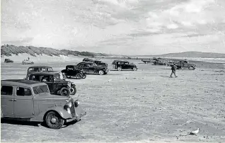  ??  ?? Travis Brown, 19, enjoys some skim-boarding at Oreti Beach on a gorgeous winter evening. KIRK HARGREAVES/STUFFPhoto­grapher unknown, Oreti Beach, Southland, pre 1948. Collection of the Southland Museum and Art Gallery Niho o te Taniwha. Gift of Ivy Edith Milburn, 1982. 83.3447