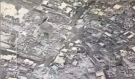  ?? AFP ?? An aerial view of Mosul provided by Iraq’s Joint Operation Command, purported to show the destructio­n of the alNuri mosque compound.