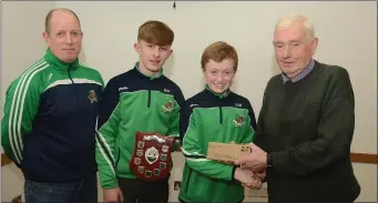  ??  ?? Wolfe Tones winners of the Fermoy Nissan Rebel Og North Cork U14B1H represente­d by Sean Moylan, Matthew Hootan and Tadgh Browne pictured at the presentati­on of medals by Chairman Sean McAullffe
