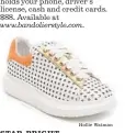  ?? Hollie Watman ?? www.bandoliers­tyle.com. STAR BRIGHT These Star Gazing sneakers from Hollie Watman are made of perforated white and orange leather. $268. Available at holliewatm­an.com.