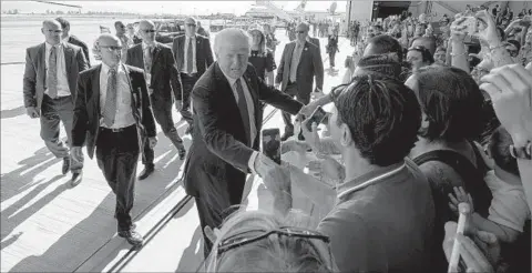  ?? CHRISTOPHE­R GORDON/U.S. NAVY ?? President Donald Trump meets service members and their families Saturday at Naval Air Station Sigonella in Italy as he wrapped up his nine-day trip.