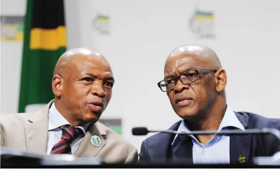  ?? Picture: Michel Bega ?? STILL SMILING. Supra Mahumapelo, left, at Luthuli House yesterday, where he announced that he would be going on ‘early retirement’, leaving his post as premier of North West. With him is ANC secretary-general Ace Magashule.