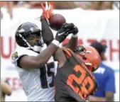  ?? DAVID RICHARD ASSOCIATED PRESS ?? Browns defensive back E.J. Gaines (28) breaks up a pass intended for Ravens wide receiver Michael Crabtree on Oct. 7.