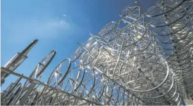  ?? STEVE RUSSELL/TORONTO STAR ?? Ai Weiwei’s Forever Bicycles exhibit at Nathan Phillips Square will be the centrepiec­e at Scotiabank Nuit Blanche this weekend.