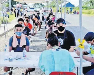  ?? Picture: JONA KONATACI ?? Members of the public during the COVID-19 vaccinatio­n drive at the Children’s Heart Hospital at Muanikau, Suva.