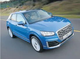  ??  ?? Left: The Q2 ushers in a new design era which makes the similarly sized Q3 look a little dated. Right: That C-pillar can be supplied in a range of colours. Boot space is smaller than the Q3 due to the lower roofline, below.