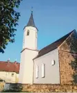  ??  ?? Die Kirche St. Veit in Oberwindac­h im Abendlicht.